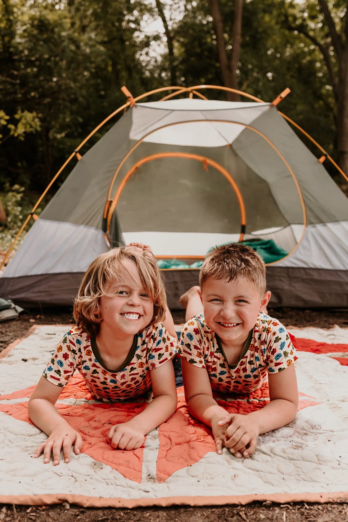 Siblings wearing the Summer Camp Shirt + Shorts Set at camp